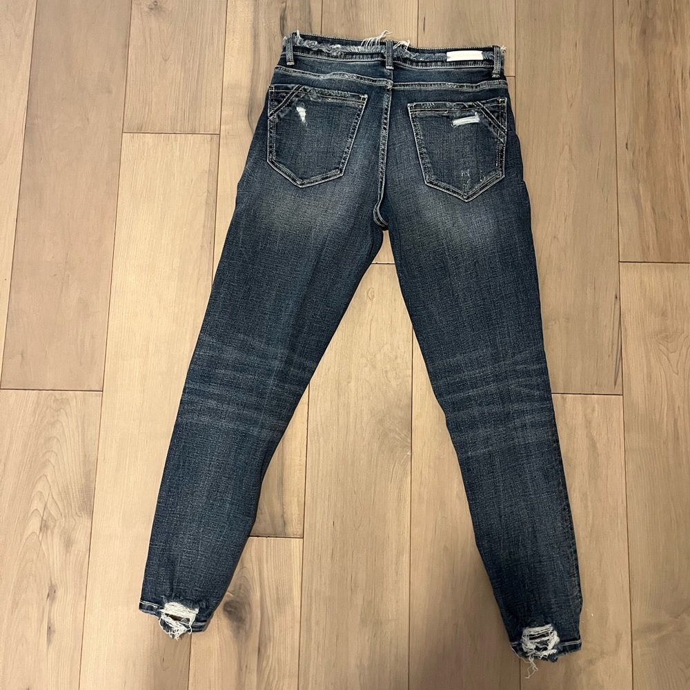 BUCKLE BLACK DENIUM JEANS